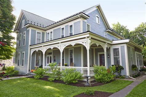 house with raised wrap around porch metal roof|wrap around porch victorian style.